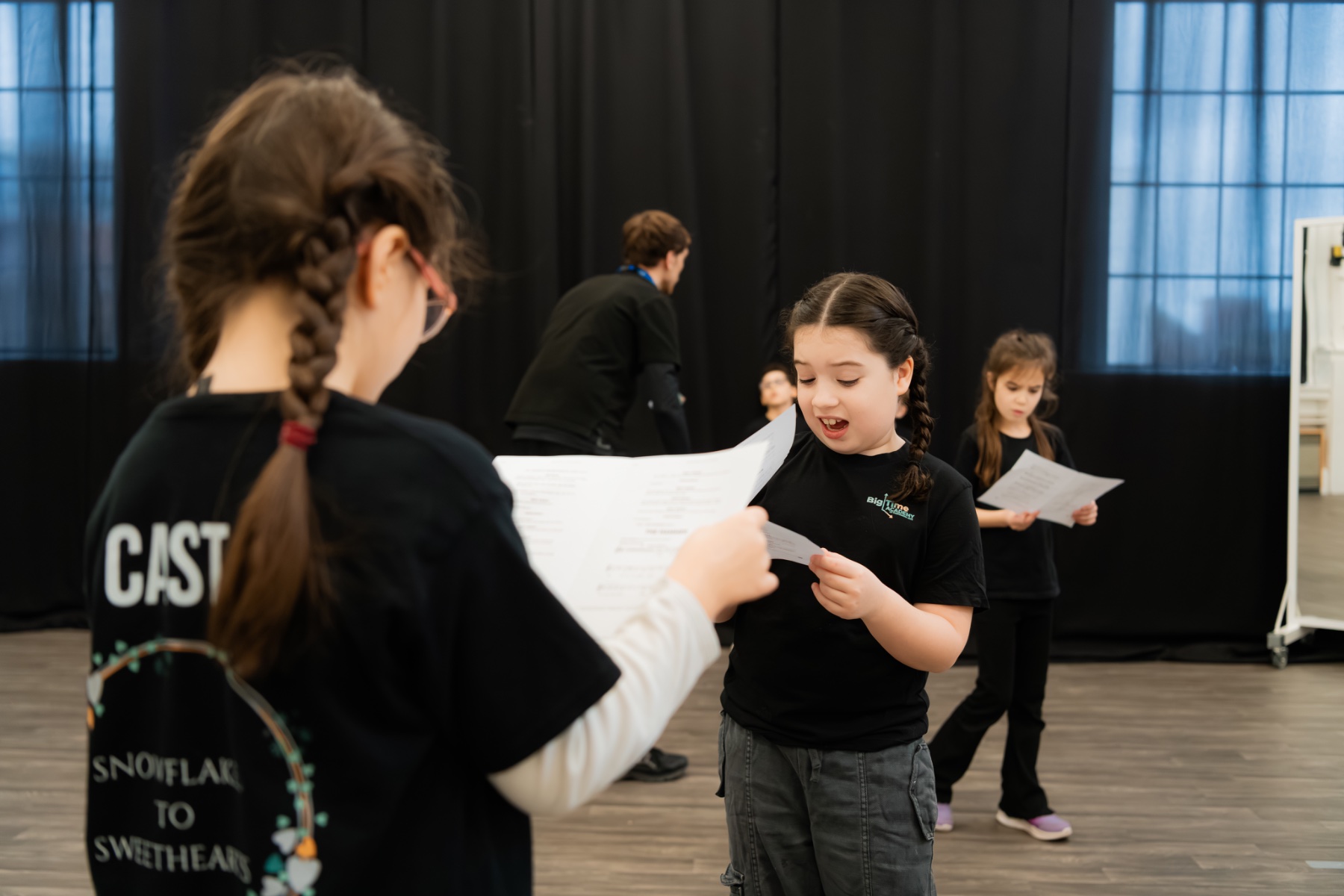 Young performers acting on stage